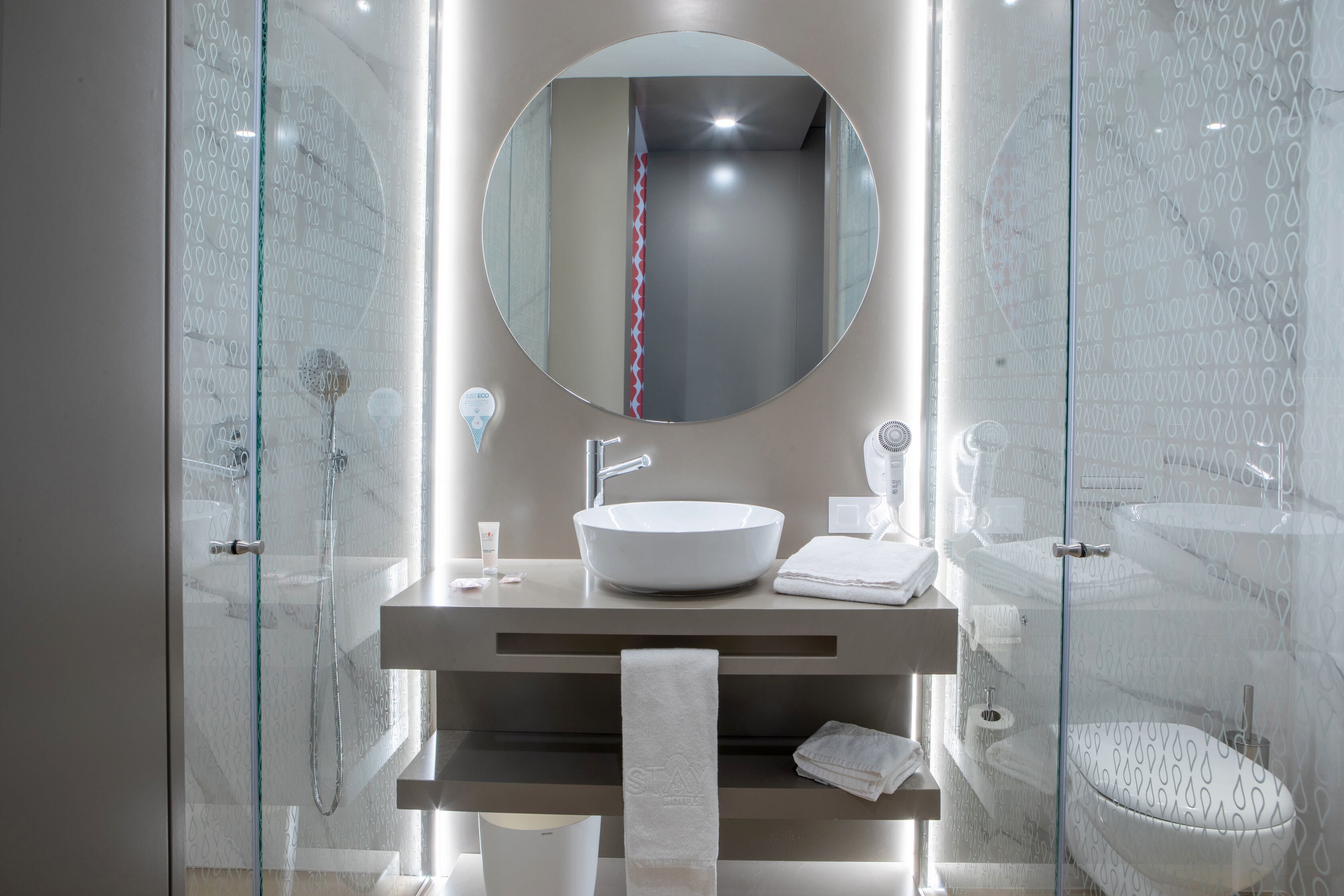 single room | bathroom | shower, rainfall showerhead, hair dryer, towels