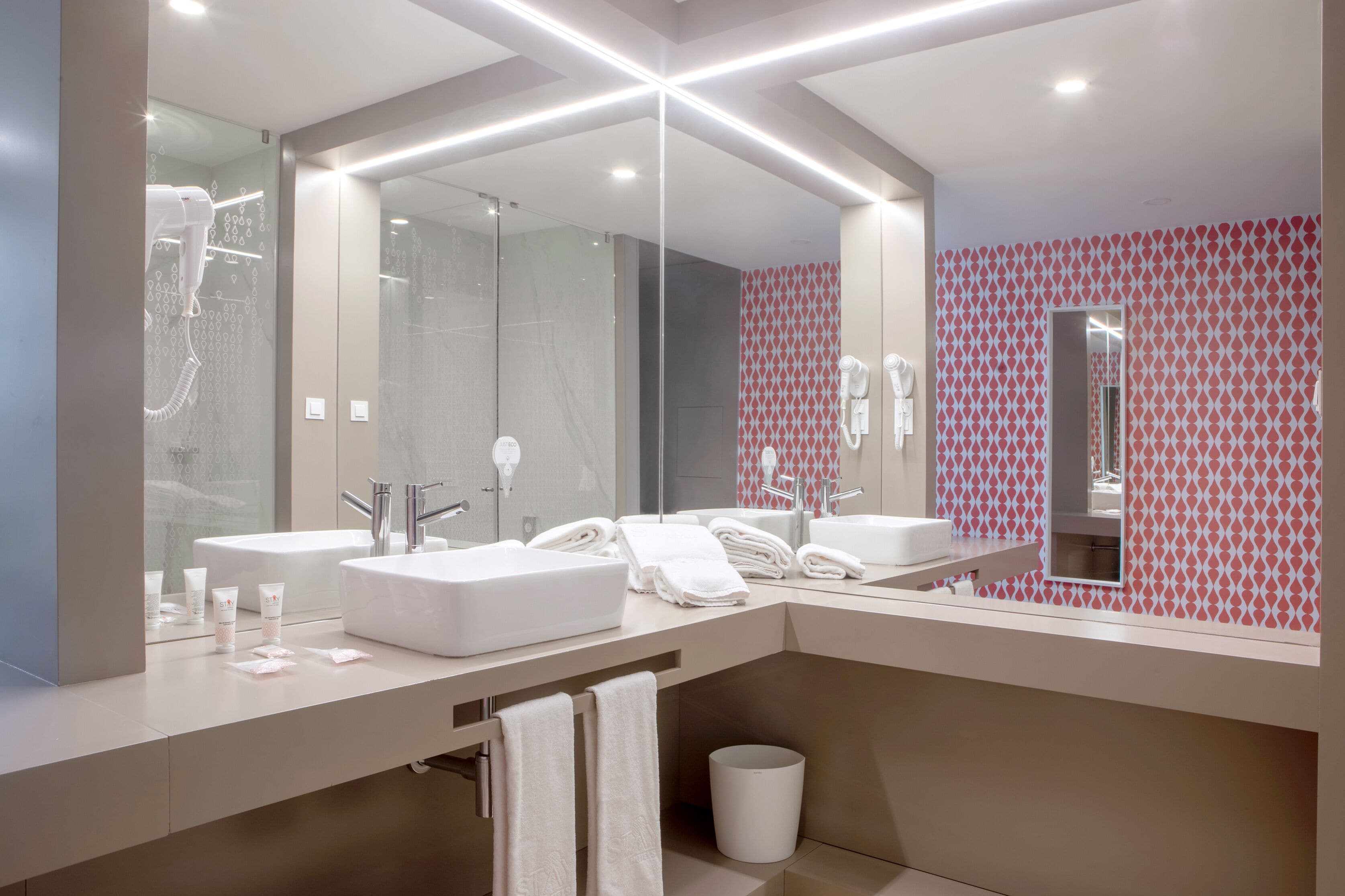 shower, rainfall showerhead, hair dryer, towels