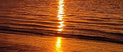 On the beach, sun-loungers, beach towels
