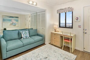 Living area - XPLORIE ACTIVITIES & LINENS INCLUDED*! Direct Oceanfront updated 2BR/2BA condo with an open den. Balcony access from living room and master bedroom. (Ocean City)
