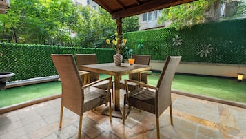 Panoramic Suite, Garden View, Garden Area | Terrace/patio