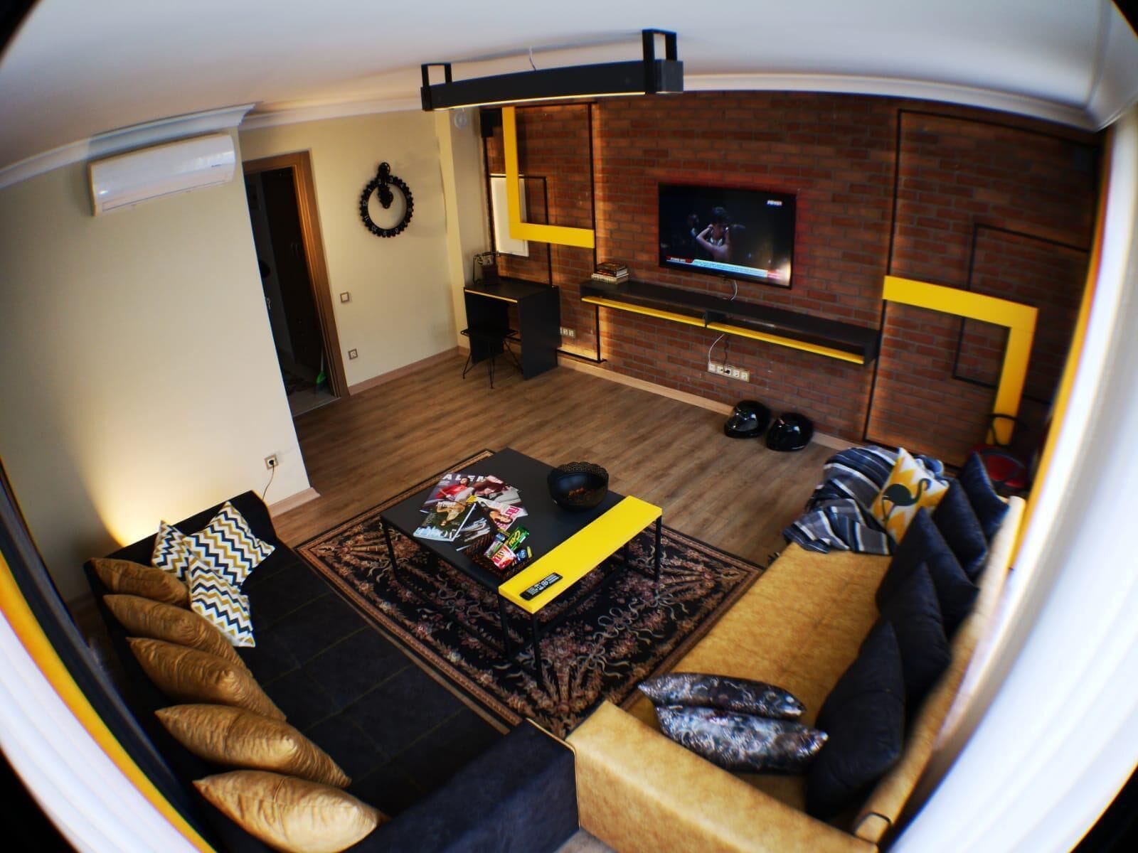 Executive suite, op Executive verdieping | Woonruimte | Een 106-cm televisie met digitale zenders