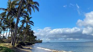 On the beach, sun loungers, beach towels