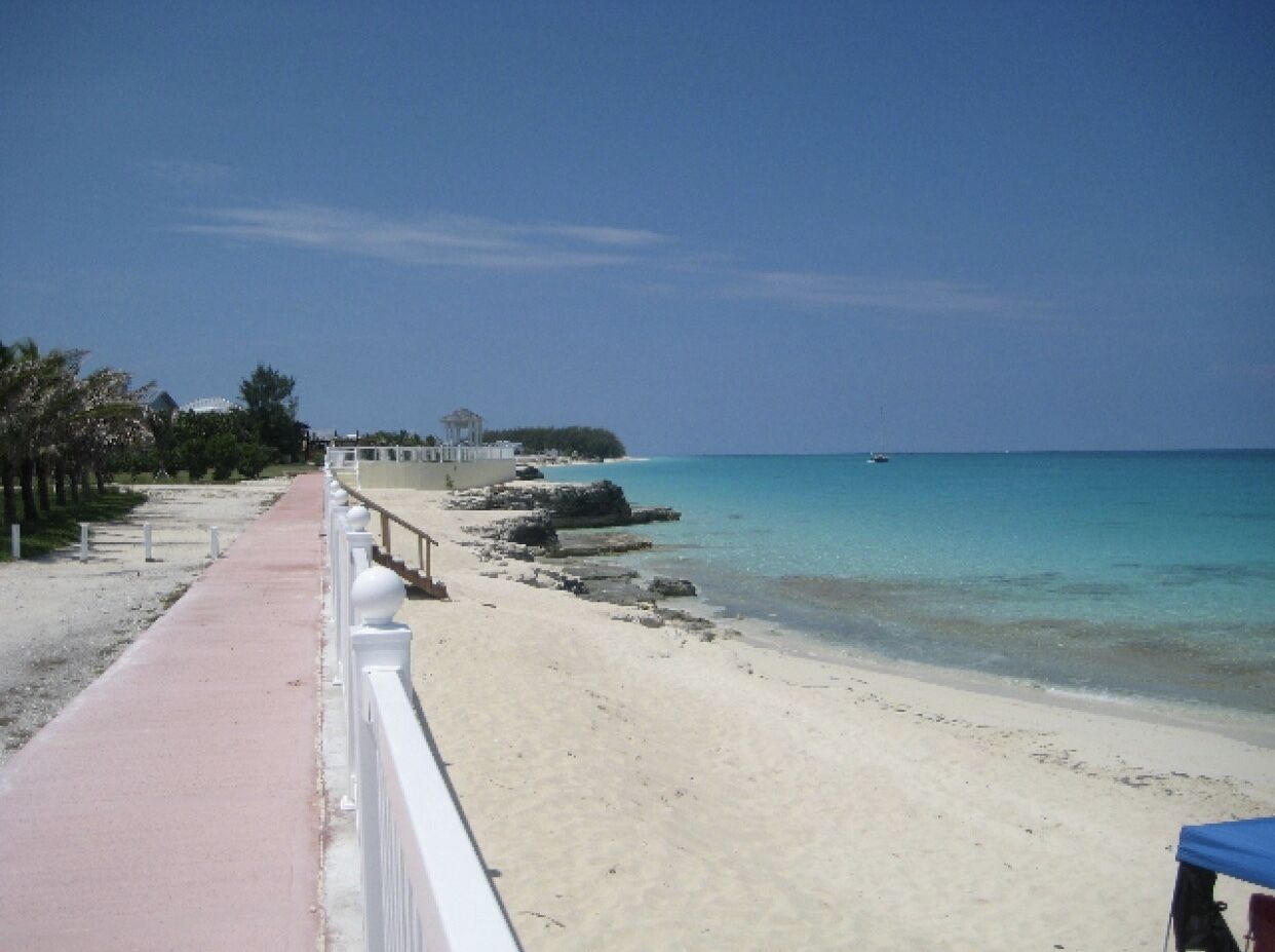 On the beach, sun loungers, beach towels