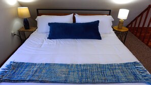 Tabla de planchar con plancha, wifi gratis y ropa de cama 
