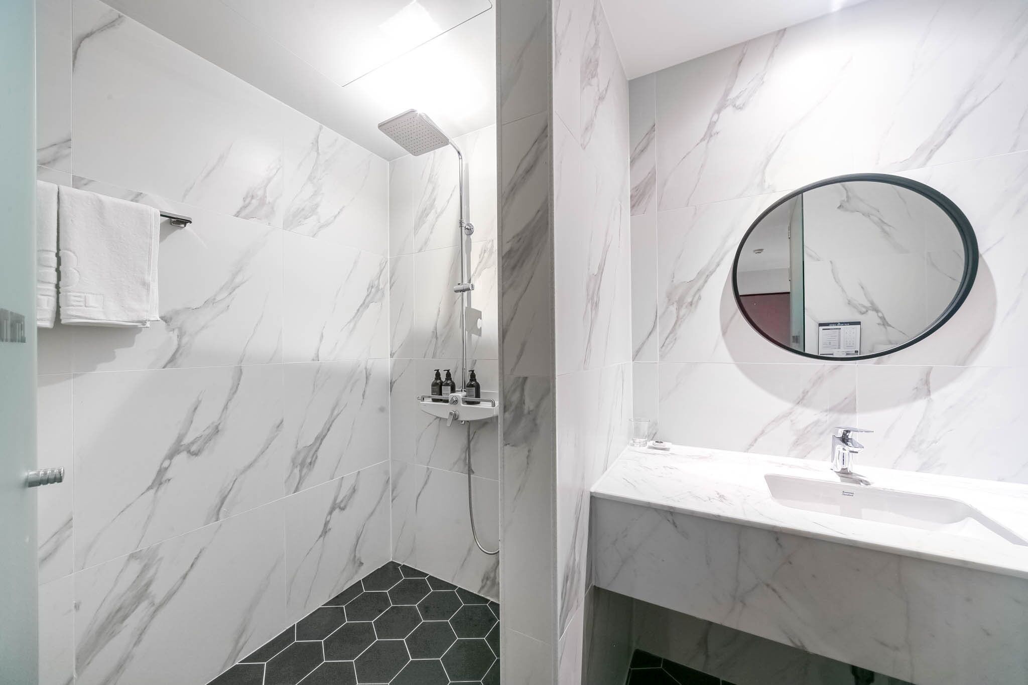 premium room, 1 king bed | bathroom shower