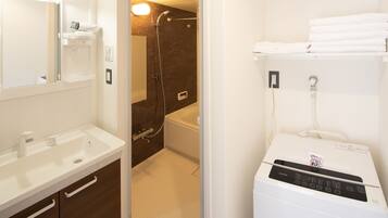 Separate tub and shower, deep soaking tub, free toiletries, hair dryer