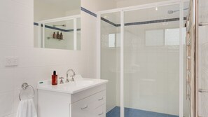 Combined shower/tub, jetted tub, eco-friendly toiletries, hair dryer