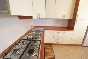 Fridge, oven, stovetop, highchair