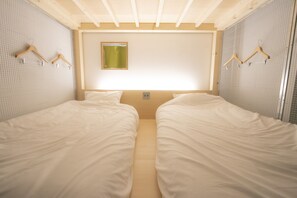 Kamar Quadruple | Tirai kedap cahaya, Wi-Fi gratis, dan seprai linen