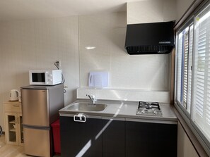 Mini-fridge, microwave, stovetop, electric kettle