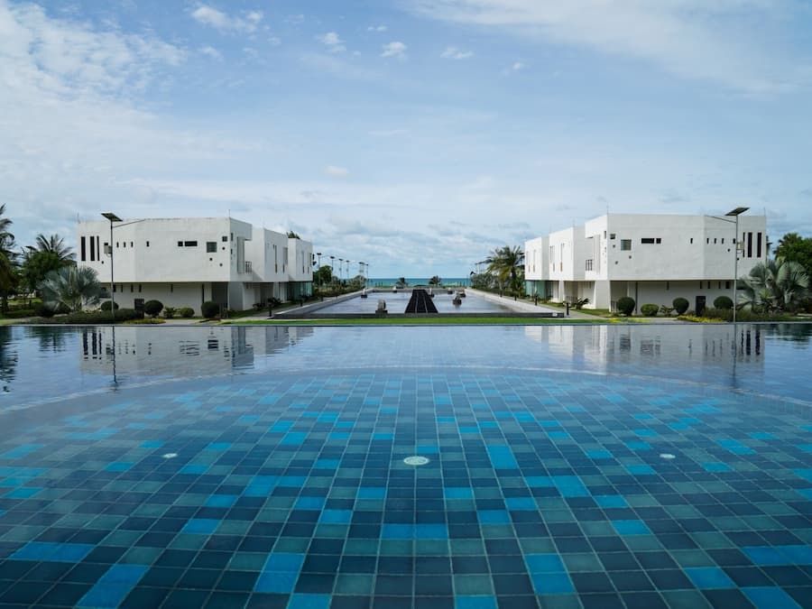 2 outdoor pools, open 7:00 AM to 7:00 PM, pool umbrellas