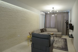 Deluxe-huoneisto | Oleskelualue | Taulutelevisio, Netflix, suoratoistopalvelut