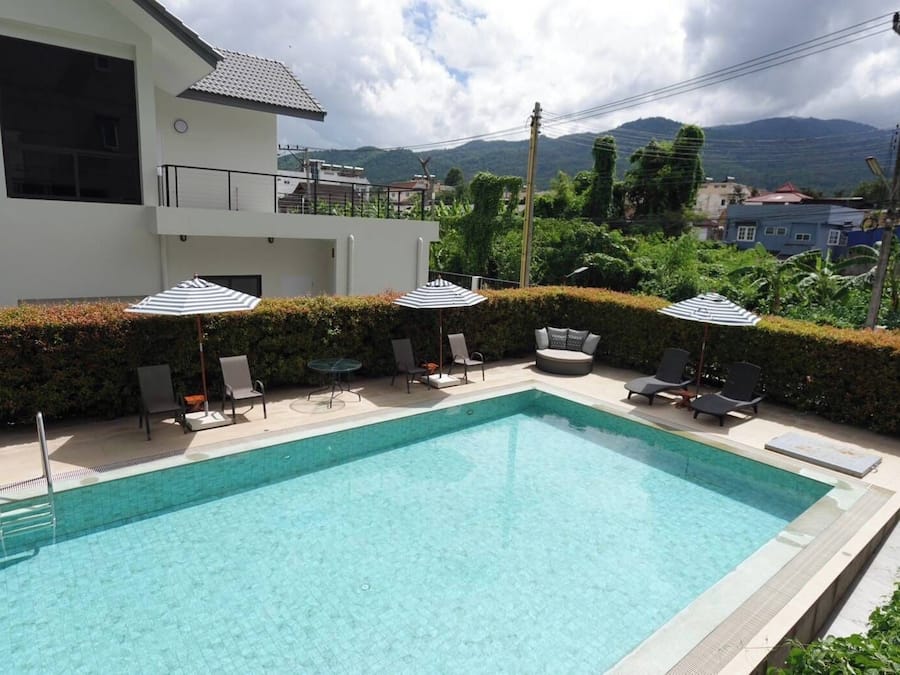 Outdoor pool, open 7:00 AM to 9:00 PM, pool umbrellas, pool loungers