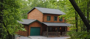 The West Virginian 3 storey log cabin in 10 acre wooded area adjacent to Pipestem State Park and Resort.