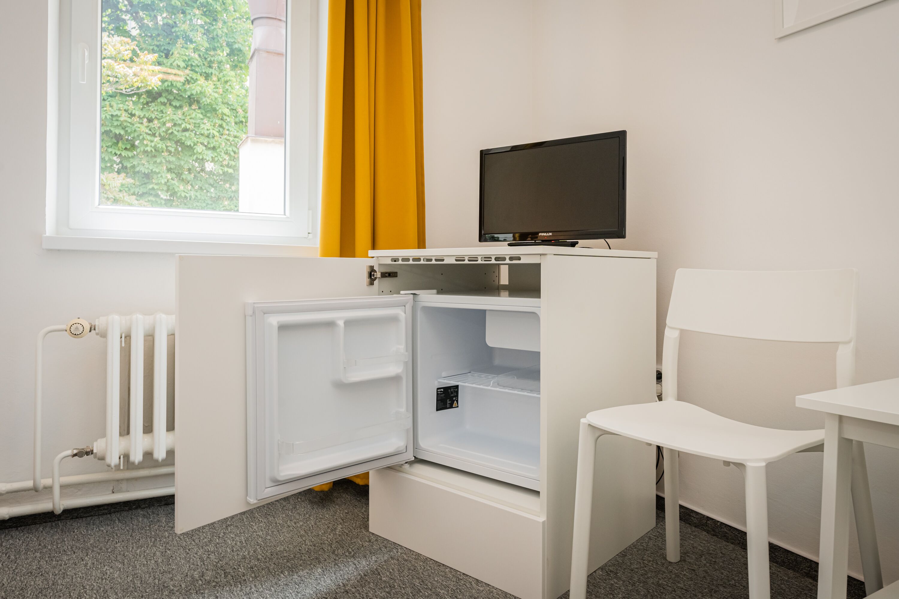 basic double or twin room, 1 bedroom, refrigerator, courtyard view | mini fridge