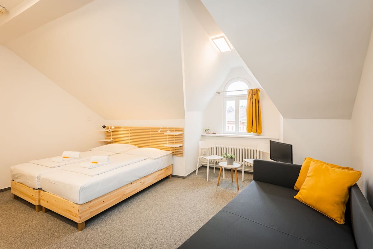 Apartamento urbano, 2 quartos, quartos conectados, vista para a cidade | Cortinas blackout, Wi-Fi de cortesia, roupa de cama