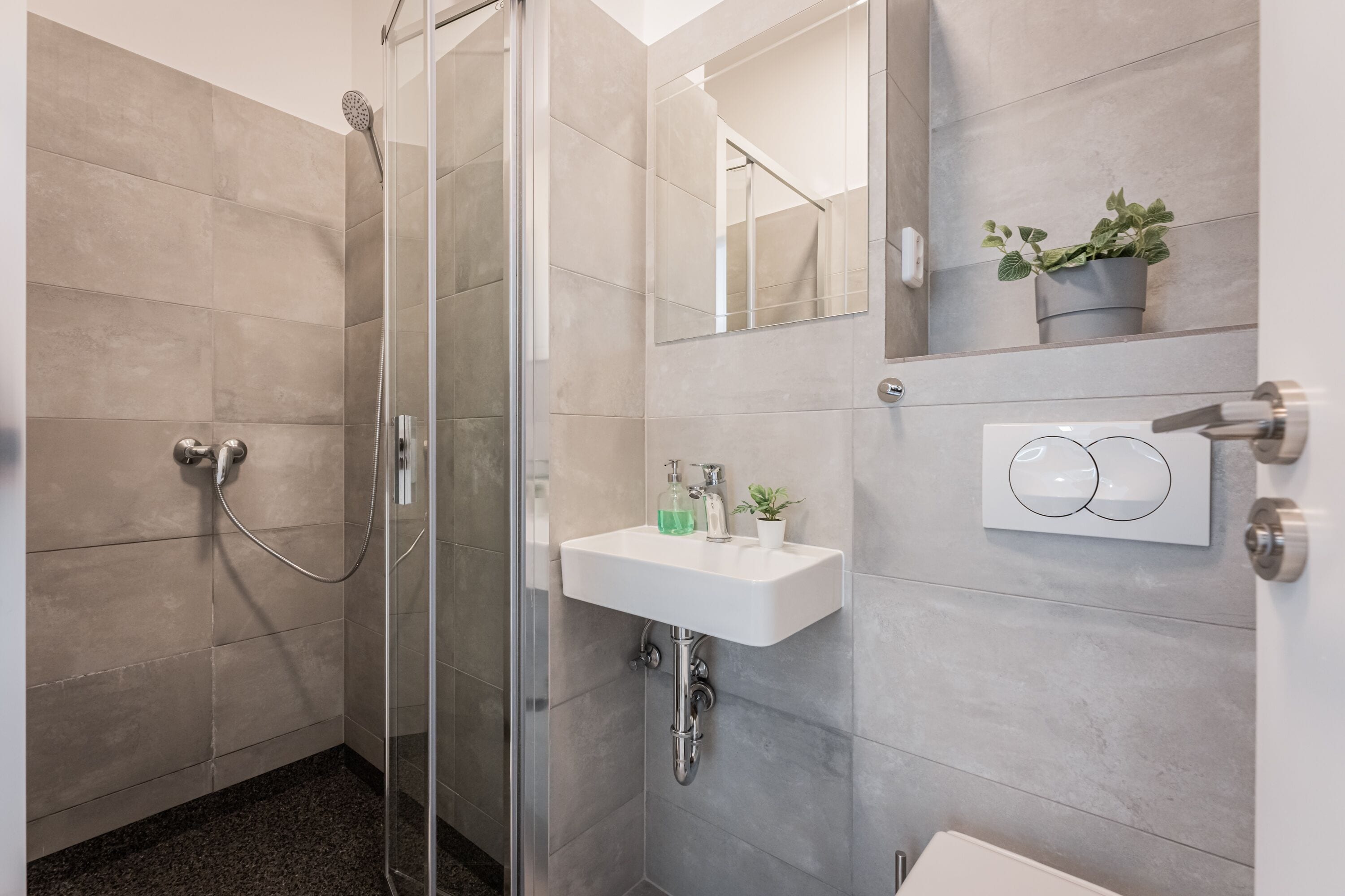 shower, rainfall showerhead, hair dryer, towels