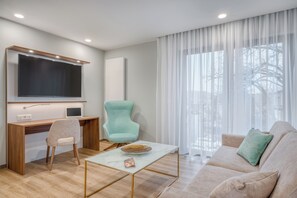 Apartamento luxo, 2 quartos, para não fumantes, cozinha | Área de estar | Escritórios