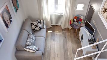 Apartment, 2 Bedrooms | Living area | LCD TV