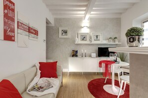 Apartamento, 1 quarto | Área de estar | TV LCD