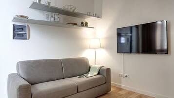 Mamo Florence - David Apartment | Area soggiorno | TV LCD