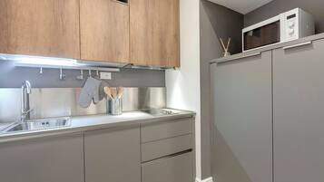 Apartment, 2 Bedrooms | Private kitchen | Fridge, microwave, stovetop, dishwasher