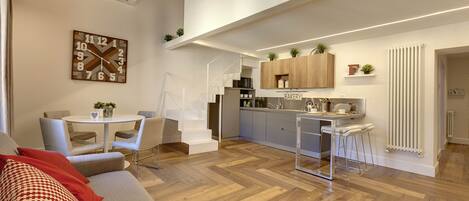 Apartamento, 2 quartos | Área de estar | TV LCD