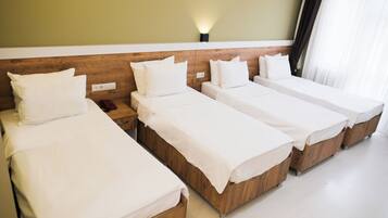 Standard Quadruple Room | Desk, free WiFi, bed sheets