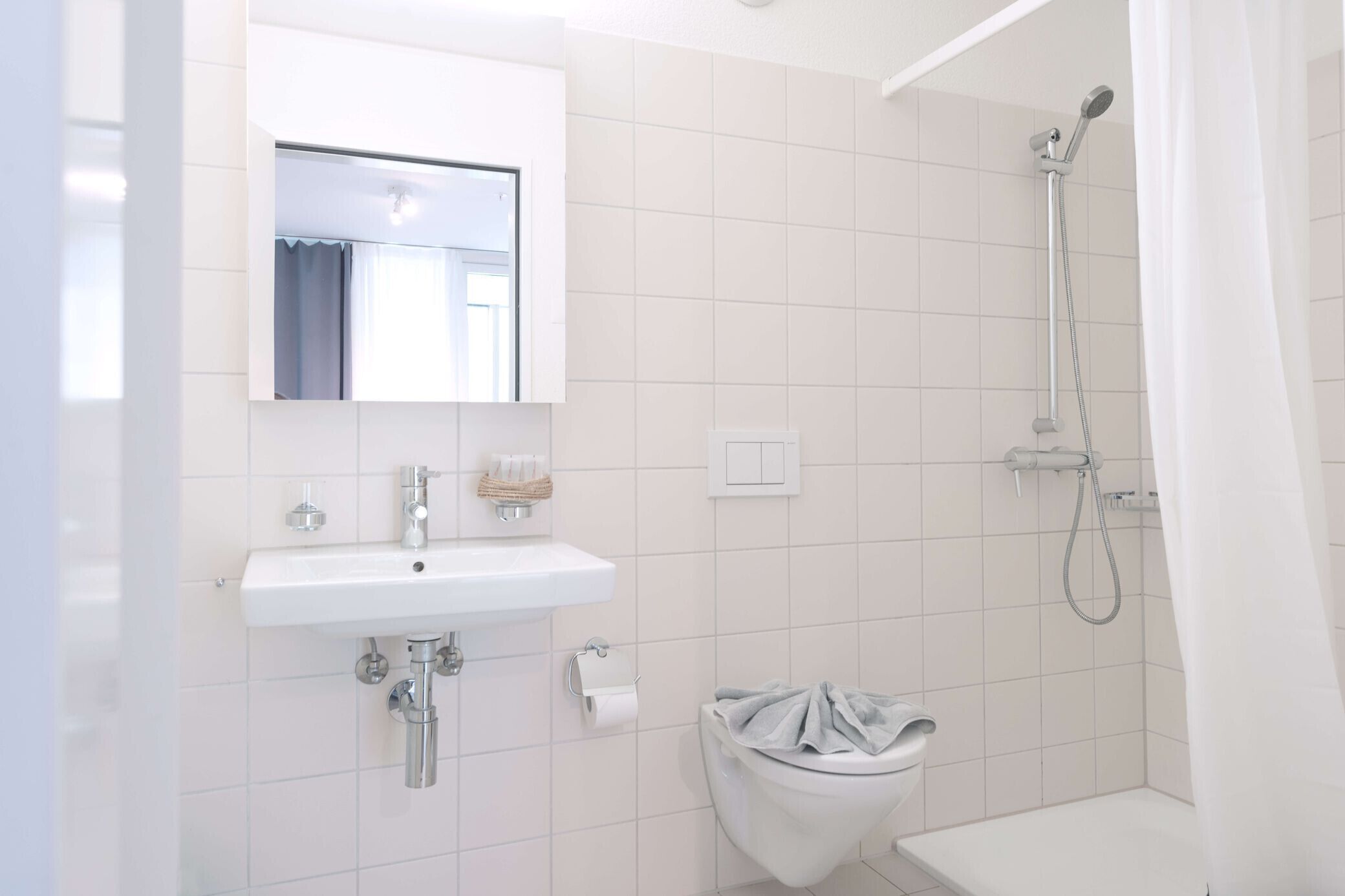 ฝักบัว, ผ้าเช็ดตัว