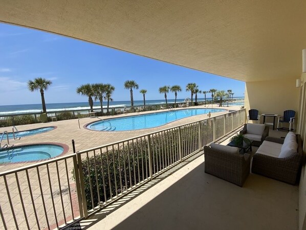 Condo, 2 Bedrooms | Pool | A heated pool - Wonderful Tropical Condo with Beach and Fitness Center Access - Unit 0102 by RedAwning (Panama City Beach)