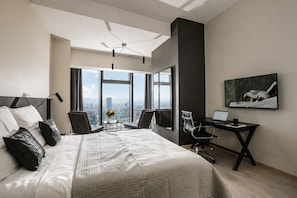 Studio Ville, 1 grand lit, vue ville, dans la tour | Literie de qualité supérieure, décoration personnalisée