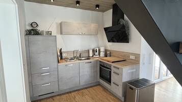 Réfrigérateur, four, plaque de cuisson, lave-vaisselle