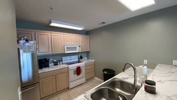 Microwave, stovetop, dishwasher, coffee/tea maker