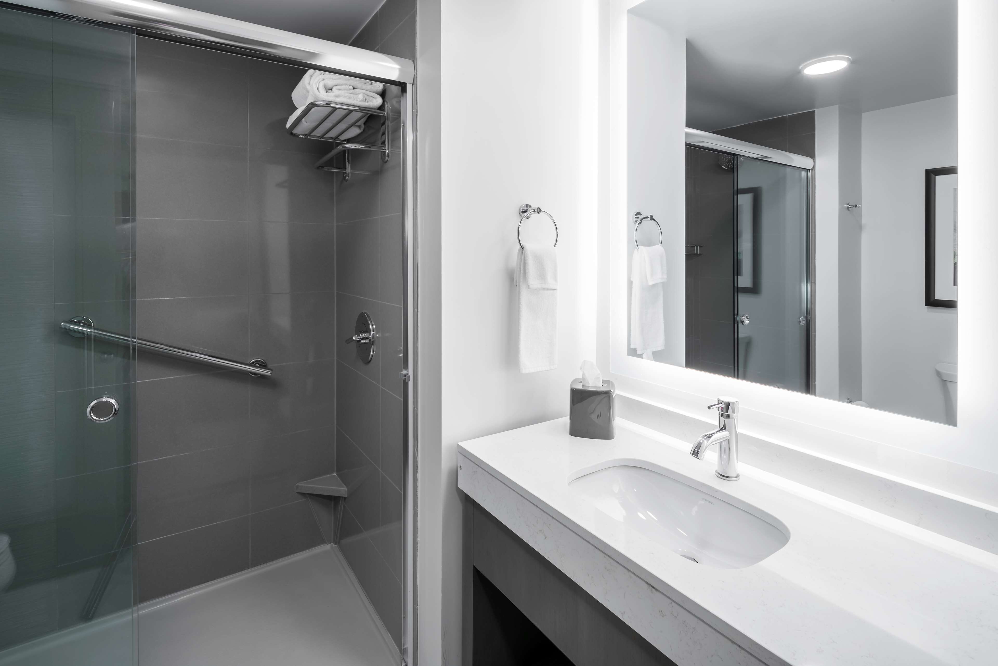 eco-friendly toiletries, hair dryer, towels, soap