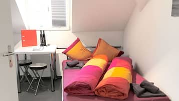 Desk, bed sheets