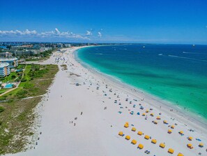 On the beach, sun-loungers, beach towels