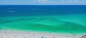 Beachfront living steps from the sand!  