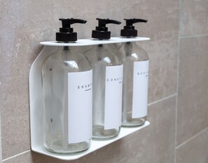 Shower, hair dryer, towels