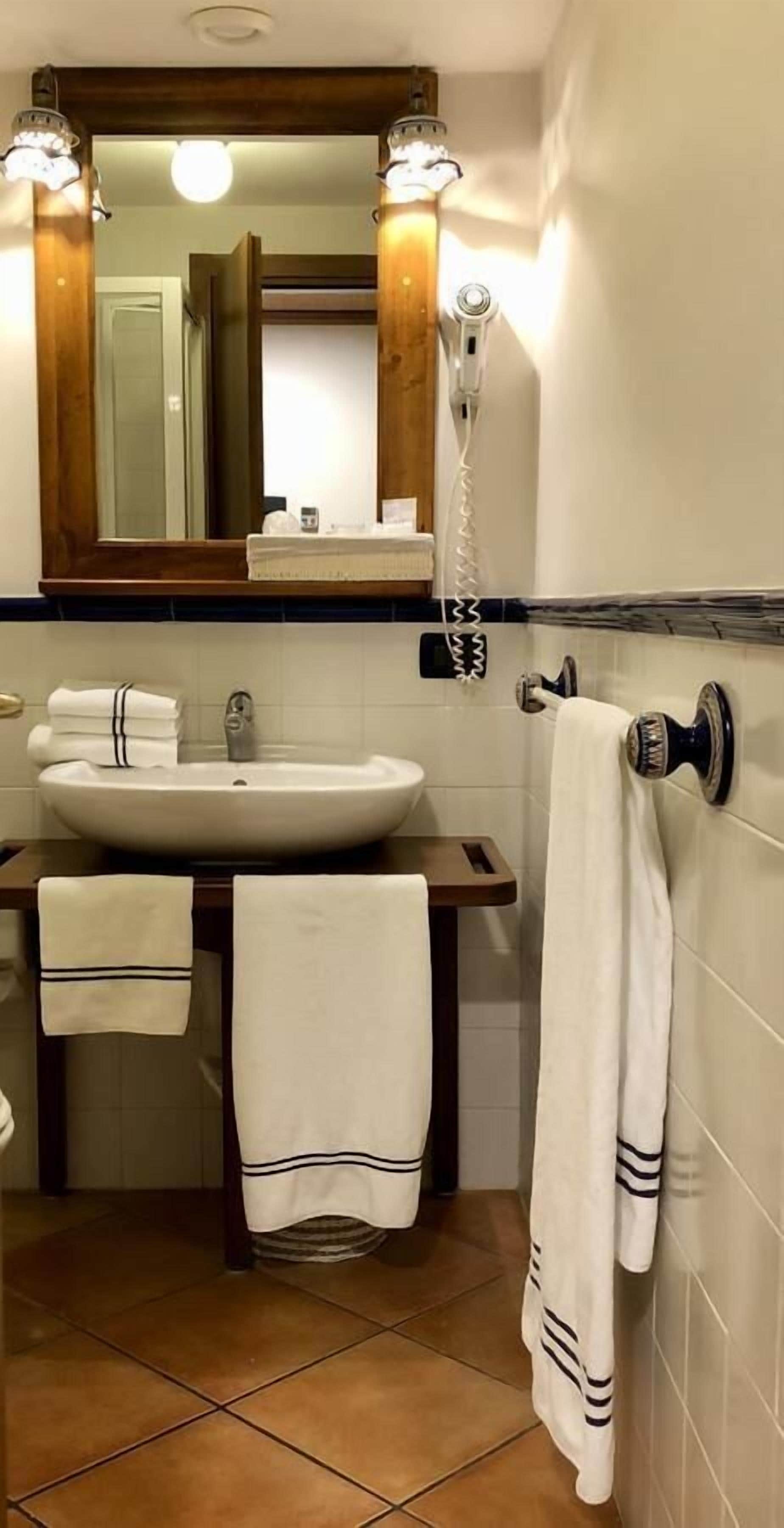classic double room single use | bathroom | shower, free toiletries, hair dryer, slippers