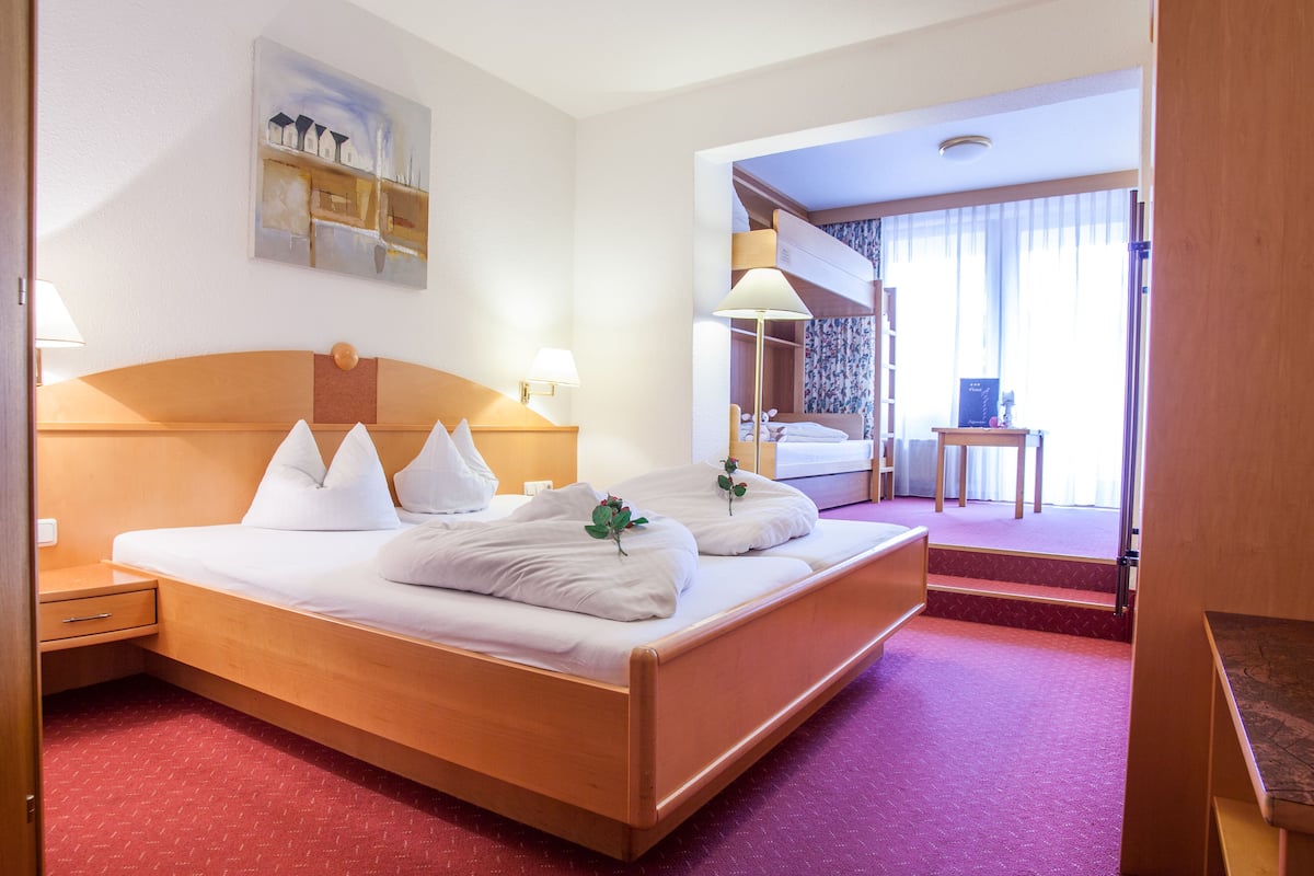 Basic Quadruple Room | In-room safe, desk, free WiFi, bed sheets