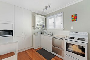 Fridge, microwave, dishwasher, toaster - Coastal City Retreat - New Brighton Accommodation (Christchurch)