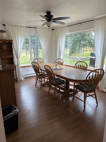 The large dining room table is perfect for family meals and cards or board games