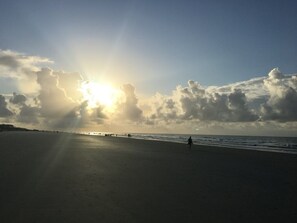 Enjoy a tranquil beach experience with a wide, open shoreline.