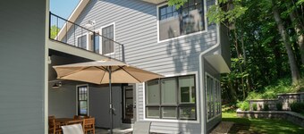 AMAZING NEWER HOME WITH LAKE VIEWS, steps away from shops and restaurants.