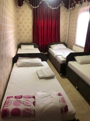 Blackout curtains, free WiFi, bed sheets