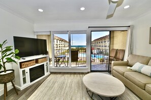 TV, fireplace, books