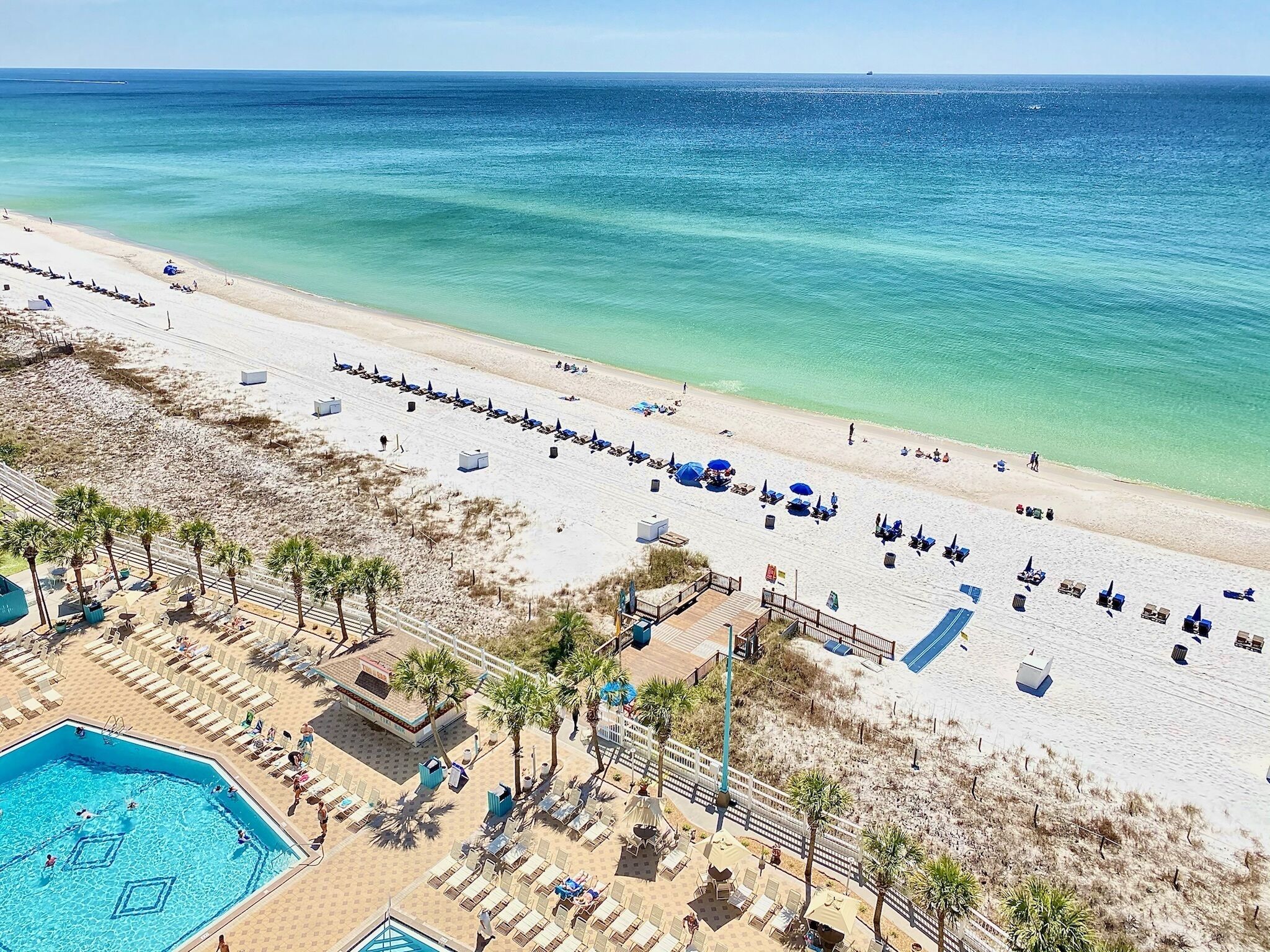 On the beach, sun-loungers