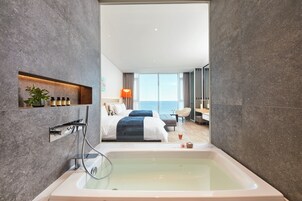 Deluxe (Ocean/1 Double+1 Single) | Premium bedding, blackout drapes, free WiFi, bed sheets