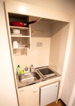 Mini-fridge, microwave, stovetop, electric kettle